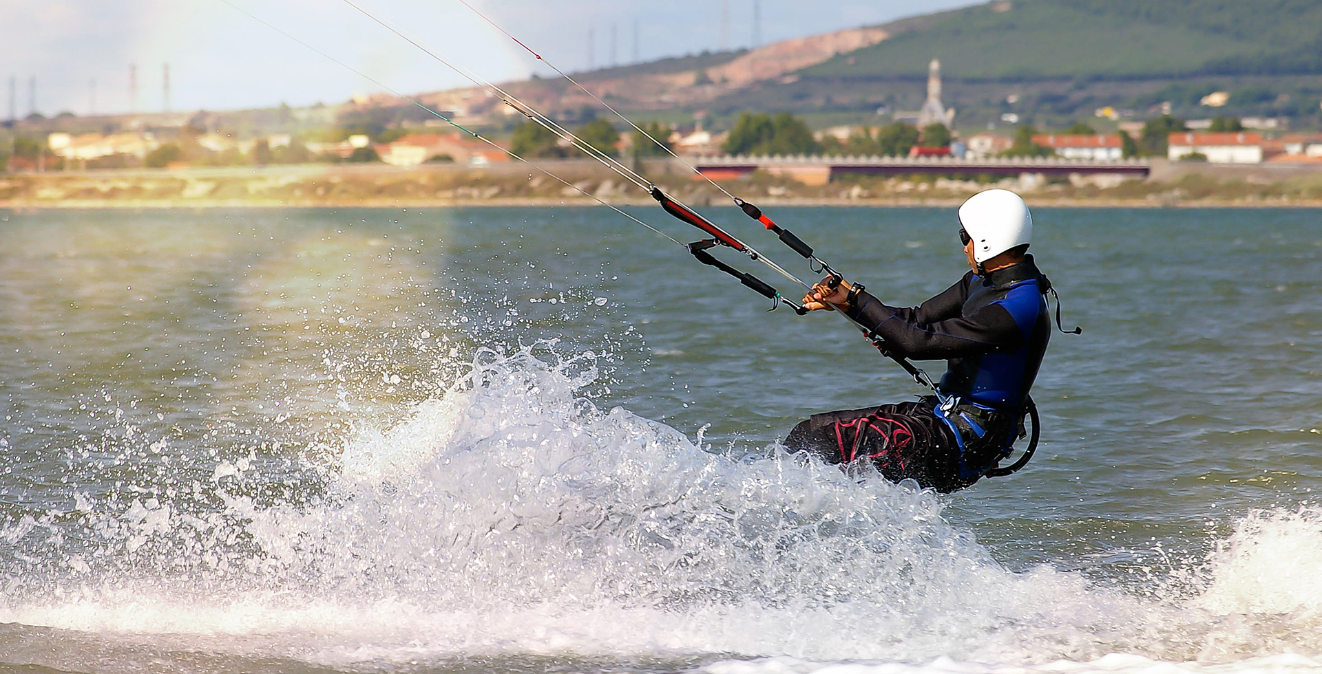 Man kitesurfing on the Ingril pond in Frontignan, in Herault, in Occitania, France